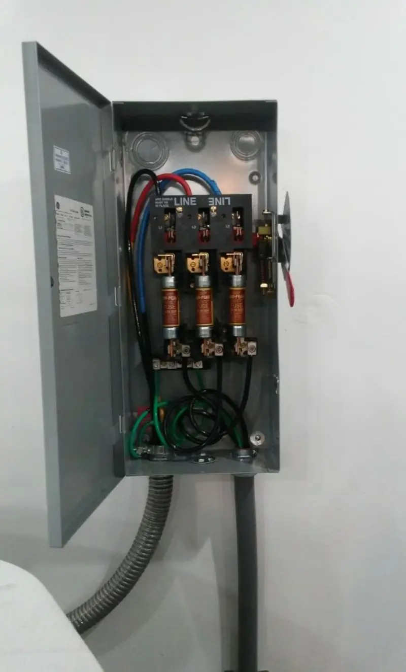 Three-phase disconnect switch installed for Smoke Detector Installation in Opa-locka